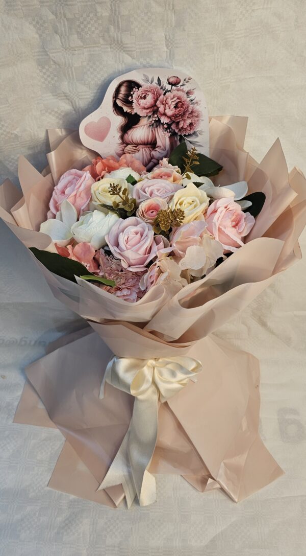 babacd6e-f216-48e1-aac0-a5eed0ee6884 باقة من الزهور “مبروك الحمل”