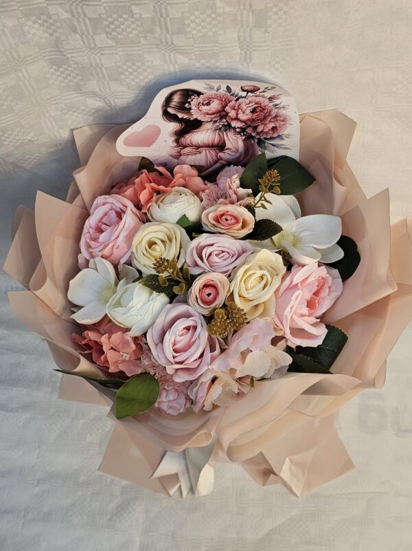 f5a0c7fe-e605-4971-95e6-958778212937 باقة من الزهور “مبروك الحمل”